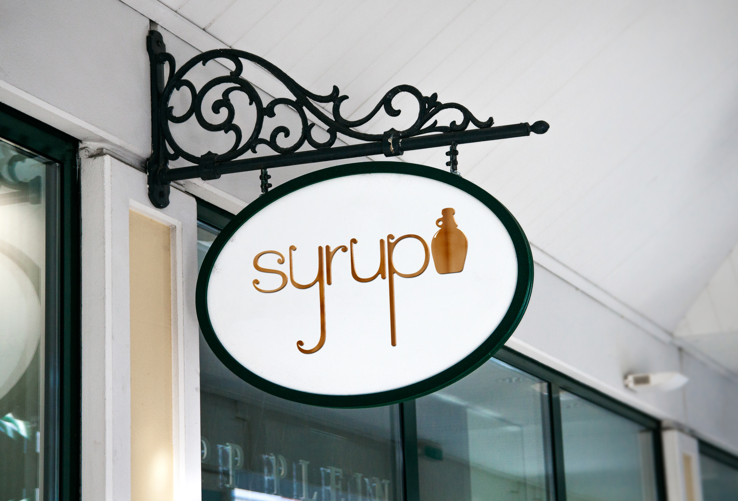 Sign outside of Restaurant for Syrup
